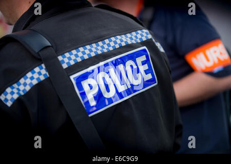 An on-street triage nurse on duty with Police in the UK. Stock Photo