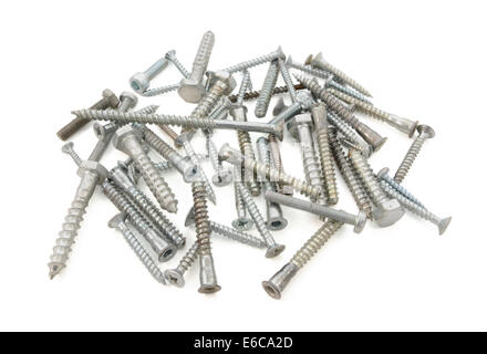 Mixed pile of screws and bolts of different sizes and kinds, isolated on a white background Stock Photo