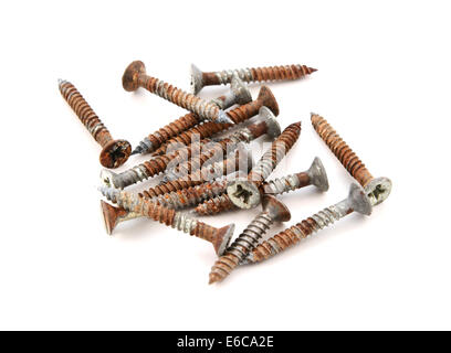 Pile of rusty Phillips head wood screws, isolated on a white background Stock Photo