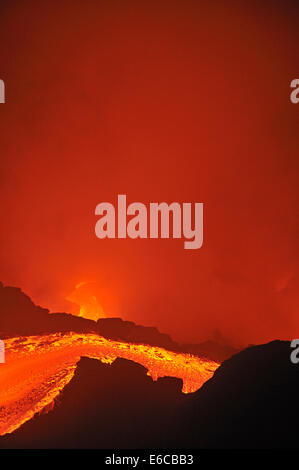 River of molten lava flowing to the sea, Kilauea Volcano, Big Island, Hawaii Islands, USA Stock Photo