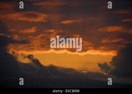 Dramatic, stormy sky at sunset, dusk, evening Stock Photo