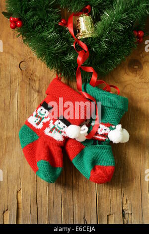 Christmas knitted socks for gifts traditional festive decoration Stock Photo