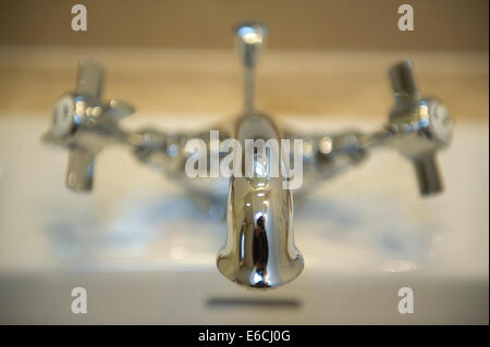 Interior shots of the refurnished rural pub The Kilpeck Inn,  Herefordshire. Close up on chrome sink mixer tap Stock Photo