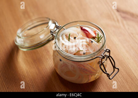 Homemade pickled onions with spice and garlic in a jar Stock Photo