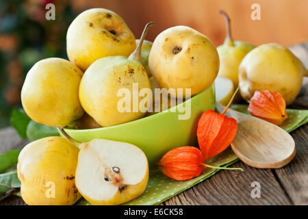 ripe pears in green bowl, in close up Stock Photo