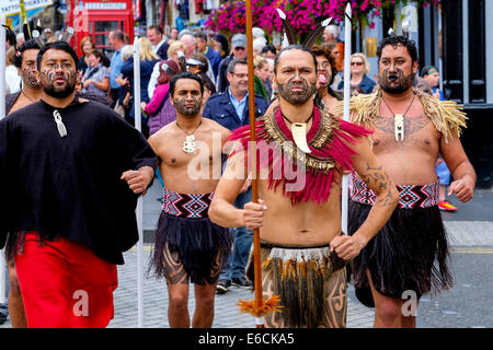 Fringe performers entertain and promote their show in the High Street, Edinburgh Stock Photo