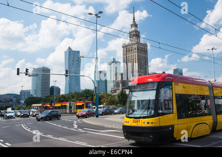 Modern tram route 73 near Palace of Culture and Science in the center centre of Warsaw, Poland Stock Photo