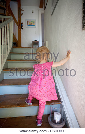 Child climbing stairs Stock Photo: 309821026 - Alamy