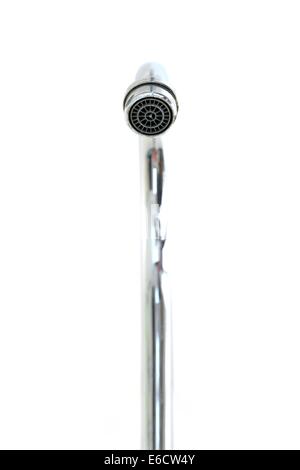 A close up shot of a bathroom faucet Stock Photo