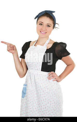 Young beautiful hispanic maid wearing apron Stock Photo