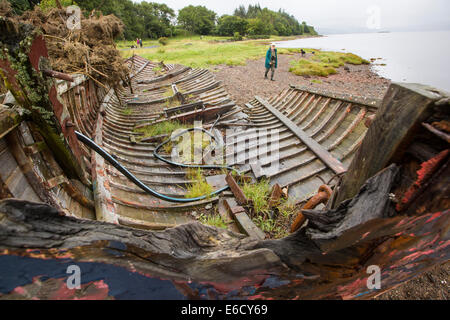 An old boat run aground at Salen on the Isle of Mull, Scotland, UK. Stock Photo