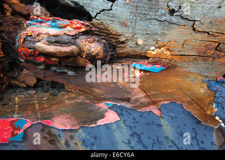 Peeling paint on an old boat run aground at Salen on the Isle of Mull, Scotland, UK. Stock Photo