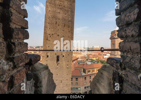 Bologna Leaning, tilting Garisenda Tower seen from the Asinelli Tower. Stock Photo