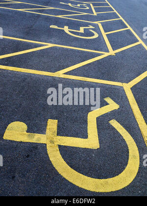 Disabled parking space sign on tarmac UK Stock Photo