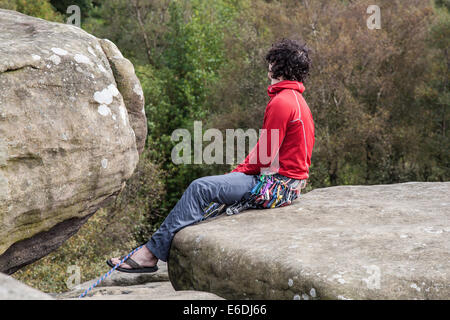 Brimham Rocks balancing natural rock formations in North Yorkshire Dales,  Active kids and visiting tourists at the National Trust Site with holidayin Stock Photo