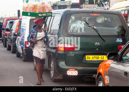 Street vendors at road junction, Accra, Ghana, Africa Stock Photo