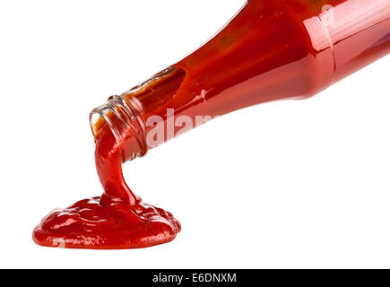 ketchup pouring out of bottle Stock Photo