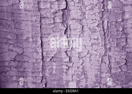 Large cracks texture purple paint on wood Stock Photo