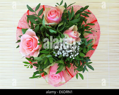 Heart shaped pink roses bouquet Stock Photo