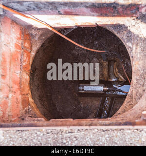 A remote control camera with wheels which drives up the sewer pipes checking the pipes for damage in the Uk Stock Photo