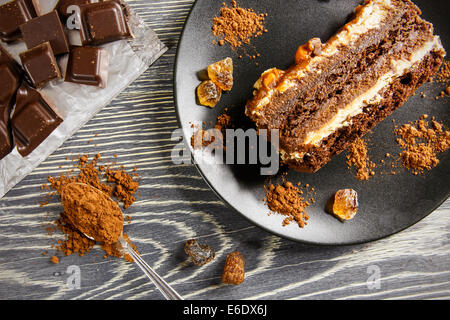 Delicious caramel pie on a wooden table Stock Photo