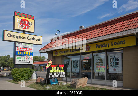 Money Mart cheque cashing and payday loans business in strip mall, Calgary, Alberta, Canada Stock Photo