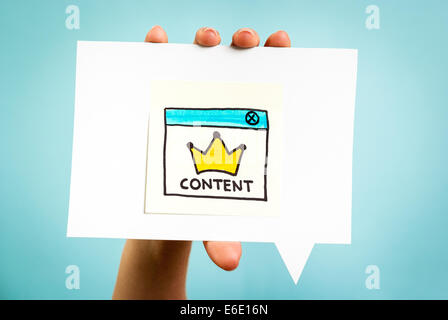 Yellow crown with content word on speech bubble and blue background. Social media concept. Stock Photo
