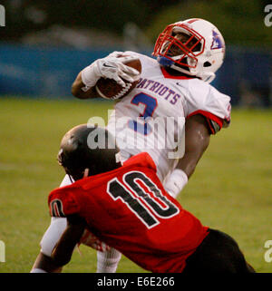 Largo, Florida, US. 21st Aug, 2014. Pinellas Park Oscee Calhoun (3) is tackled by Dunedin High School's Janiero Crankfield (10) during Thursday's (8/21/14) preseason football jamboree game hosted at Largo High School. © Douglas R. Clifford/Tampa Bay Times/ZUMA Wire/Alamy Live News Stock Photo