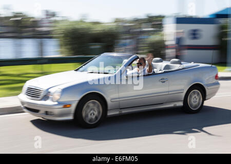 Caucasian Man Driving Luxury Convertible Car, Ft Lauderdale, FL, USA Stock Photo