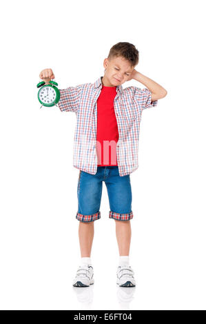 Boy with alarm clock Stock Photo