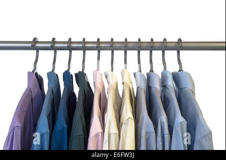 A mixture of shirts on a hanging rail. Stock Photo