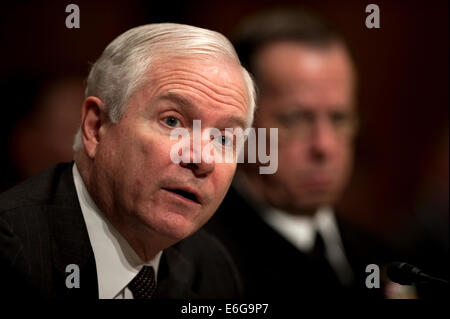 US Secretary of Defense Robert M. Gates testifies at the Senate Armed Services Committee on the troop serge sending an additional 30,000 troops to Afghanistan in the Dirksen Senate Office Building December 2, 2009 in Washington, DC. Stock Photo