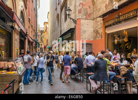 Shops and cafe on Via Pescherie Vecchie in the historic Quadrilatero market district, Bologna, Emilia Romagna, Italy Stock Photo