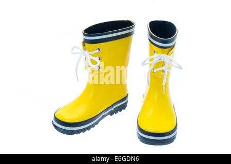 A pair of yellow rubber boots on a white background Stock Photo