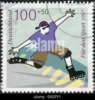 GERMANY - CIRCA 1997: Postage stamp printed in Germany, shows the Inline skating, circa 1997 Stock Photo