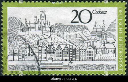 GERMANY - CIRCA 1970: Postage stamp printed in Germany, shows a View of Cochem and Moselle River, circa 1970 Stock Photo