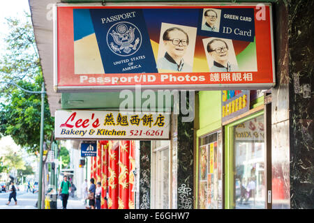 Honolulu Hawaii,Oahu,Hawaiian,Chinatown,North King Street,businesses,district,signs,passport business,green card,ID card,service,USA,US,United,States, Stock Photo