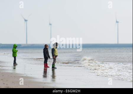 Kids on the beach in Oosterschelde, The Netherlands Stock Photo
