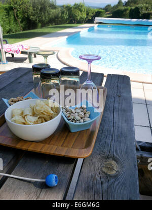 Swimming pool and pool side snacks at a holiday villa in the French medieval town of Mirepoix, Ariege, Pyrenees Stock Photo