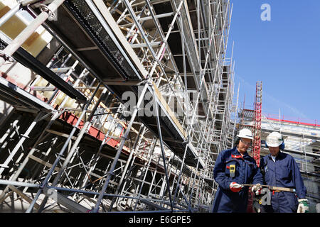 construction workers and building site Stock Photo