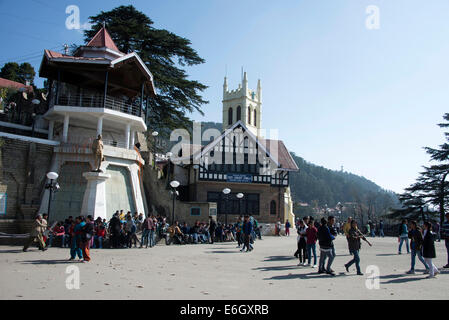 Visitors on the Ridge with Christ Church tower in Shimla , Himachal Pradesh, India Stock Photo