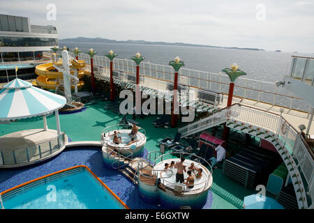 Swimming in the Norwegian Pearl cruising the Inside Passage from Seattle to Alaska. The Pearl belongs to the Norwegian Cruise Li Stock Photo