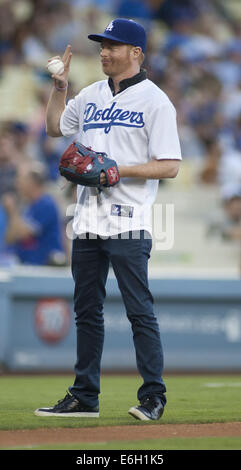 Aug. 22, 2014 - Los Angeles, CALIFORNIA, USA - LOS ANGELES, CA - AUGUST 22: Actor Jesse Ferguson throws out the ceremonial first pitch before the game between the New York Mets and the Los Angeles Dodgers at Dodger Stadium on August 22, 2014 in Los Angeles, California..ARMANDO ARORIZO (Credit Image: © Armando Arorizo/Prensa Internacional/ZUMA Wire) Stock Photo