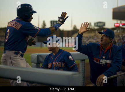 Los Angeles, CALIFORNIA, USA. 23rd Aug, 2014. LOS ANGELES, CA - AUGUST 22: Curtis Granderson #3 of the New York Mets gets high five bye the coach after scoring on a solo homerun to take a 1-0 lead over the Los Angeles Dodgers during the first inning at Dodger Stadium on August 22, 2014 in Los Angeles, California.ARMANDO ARORIZO © Armando Arorizo/Prensa Internacional/ZUMA Wire/Alamy Live News Stock Photo