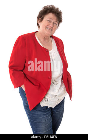 Portrait of an older retired happy woman isolated on white wearing a red jacket. Stock Photo