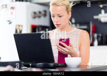 Business woman working from home. Stock Photo