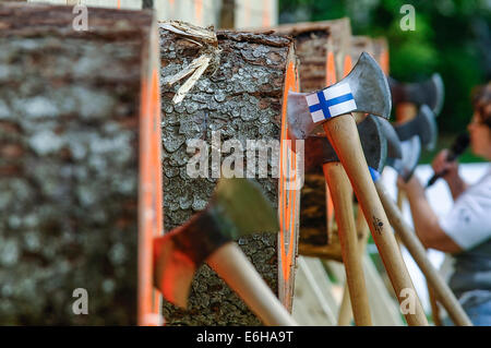 Maetaguse, Estonia. 23rd Aug, 2014. Axes are seen on the targets during the Nordic axe throwing championship in Maetaguse, Estonia, on Aug. 23, 2014. More than 100 best axe throwers from Denmark, Sweden, Finland and Estonia compete in the Nordic axe throwing championship, which lasts from 22 to 23 of August. © Sergei Stepanov/Xinhua/Alamy Live News Stock Photo