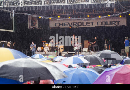 Syracuse, New York, USA. 22nd Aug, 2014. Musicians play as the rain falls on the opening day of the Great New York State Fair in Syracuse. © Zach Roberts/ZUMA Wire/ZUMAPRESS.com/Alamy Live News Stock Photo