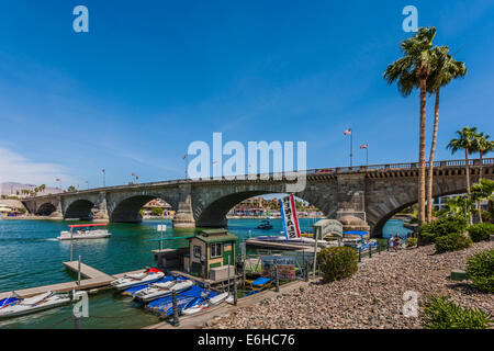 Boats on waterway under the London Bridge in Lake Havasu City, Arizona Stock Photo