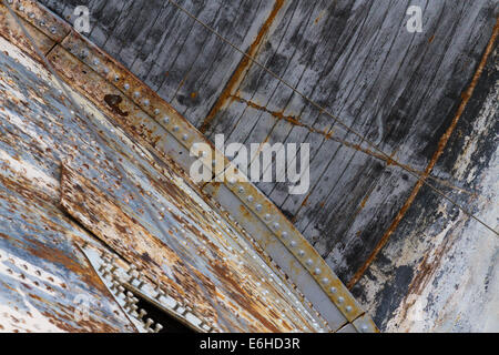 Rusted metal structure with bolts and rivets provided abstract design for backgrounds Stock Photo